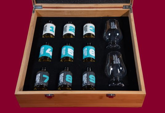 9 bottle sample box along with 2 complimentary BWW Glencairn glasses.
